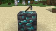 Mining ores with the wrong pickaxe will not drop the mineral (Image via Sportskeeda Gaming/Mojang)
